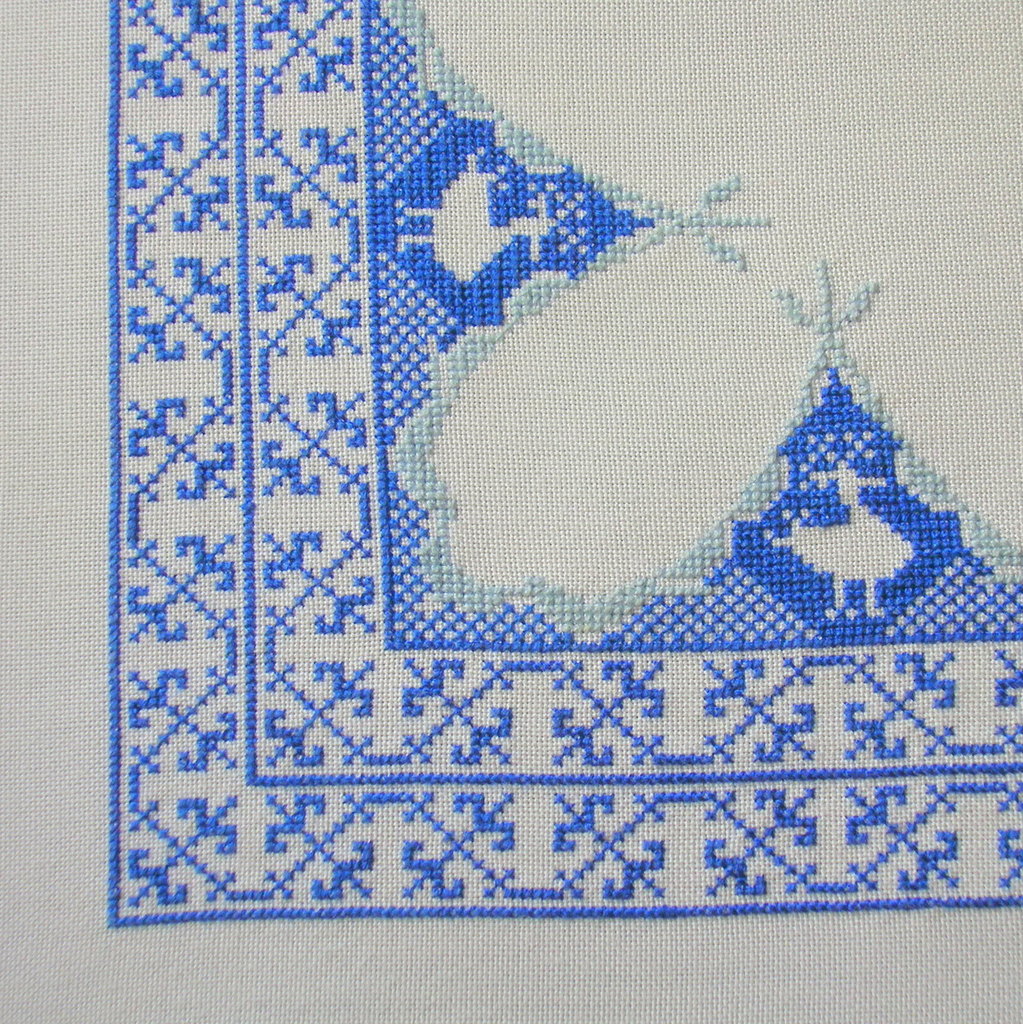 Mantel de punto de cruz. Detalle